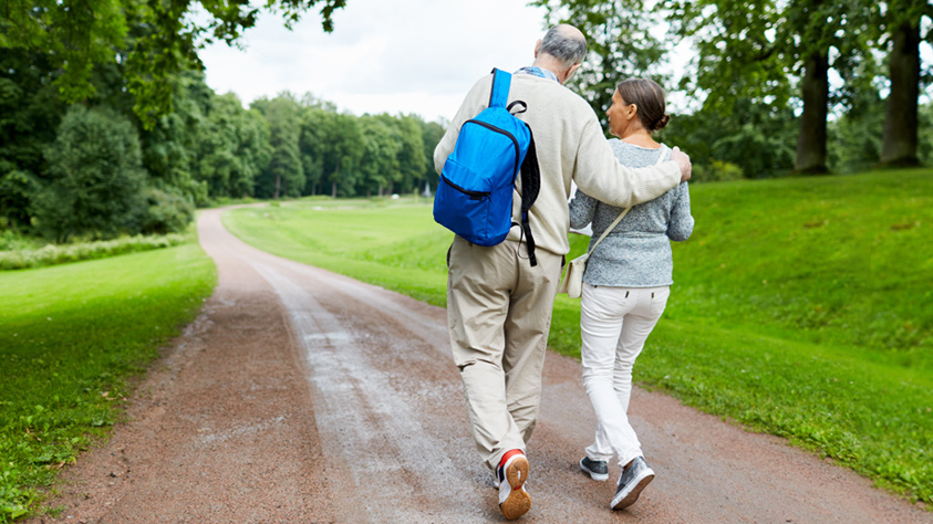 Couple walking countryside